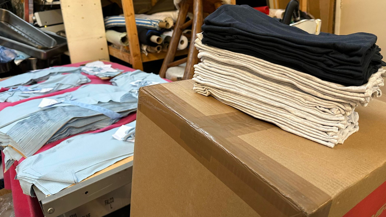 Stack of embroidered t-shirts